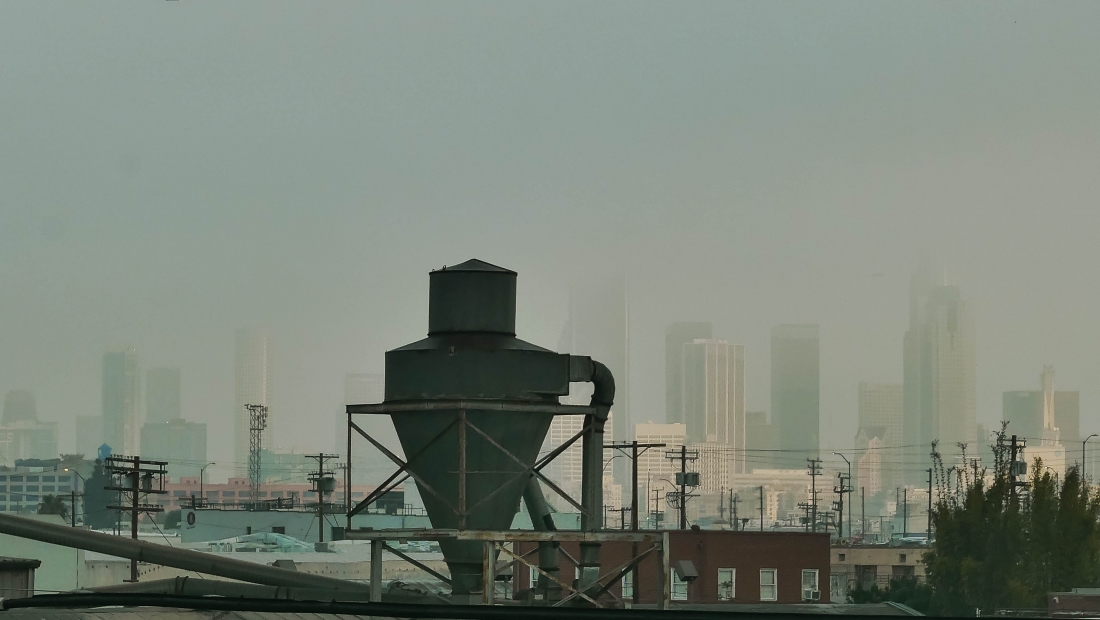 Downtown LA buildings seen from freeway at a gloomy day