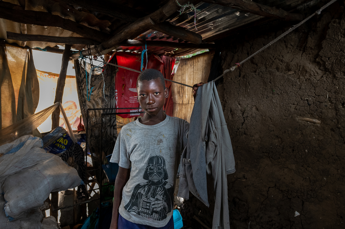 Wilson M. in his hut, Chokwe, Mozambique