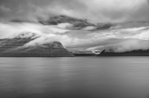 FLOWING CLOUDS ABOVE FJORDS