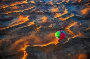 Flying over the desert at sunrise